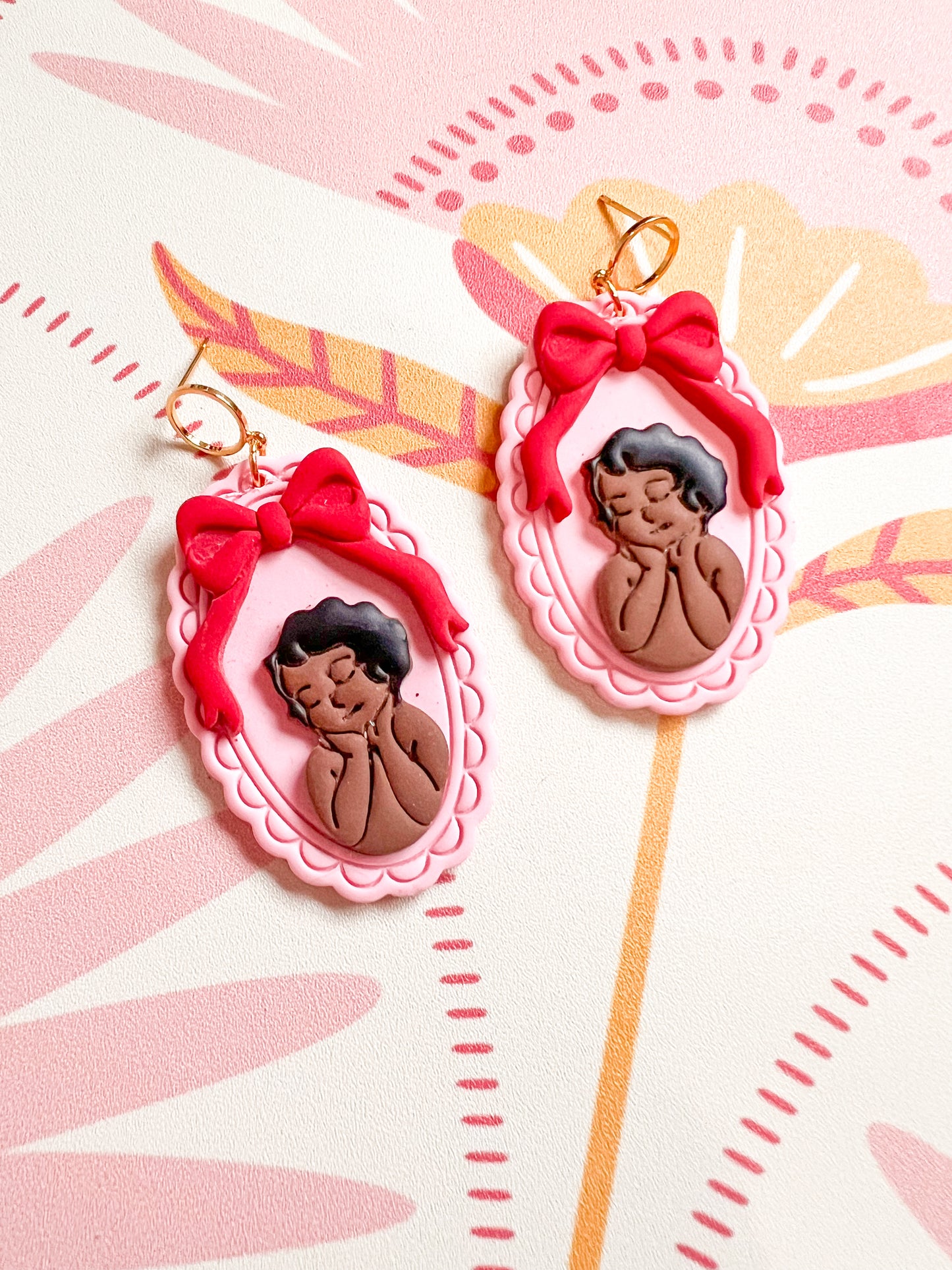 Framed Cherub Dangles